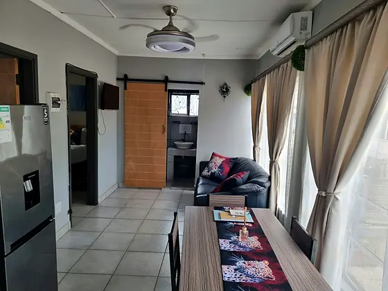 Living and dining area in Unit 1