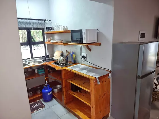 Kitchen and fridge in Unit 4