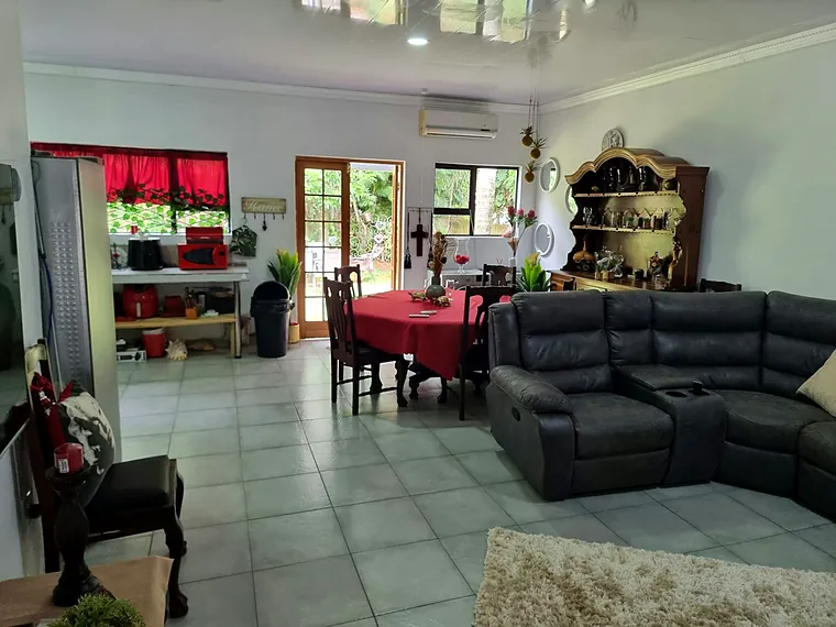Kitchen and dining area with doors onto the garden